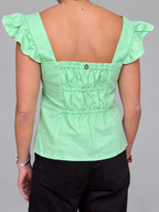 Polera IO, vista posterior